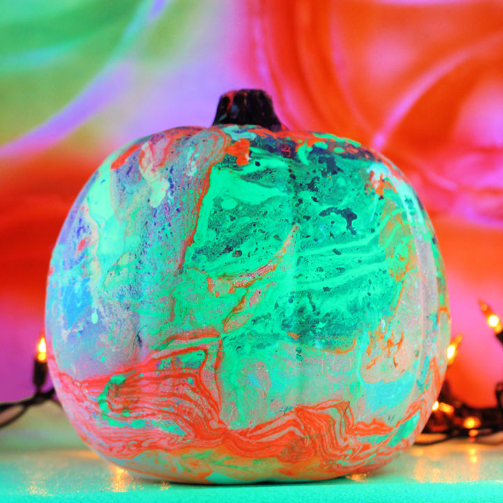 50 Easy Pumpkin Painting Ideas 2024 For Halloween DIY Marbled Blacklight Pumpkin