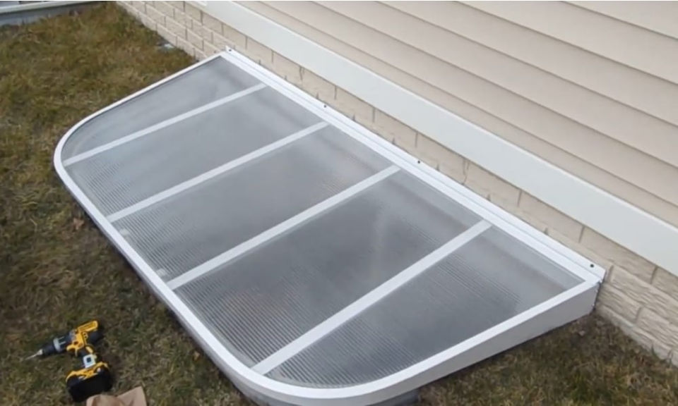 DIY Window Well Cover to Protect Your Basement - Blitsy